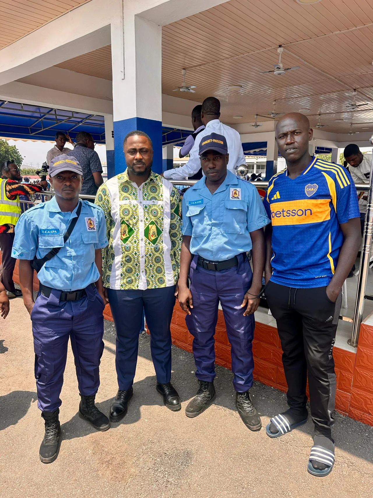 Edwin Elikem Amenyeawu with Youth Employment Agency Community Protection Assistants